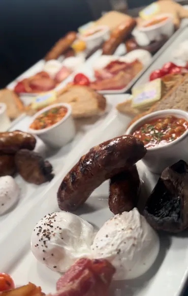 Full English breakfast with Cumberland sausages and beans at Zest York